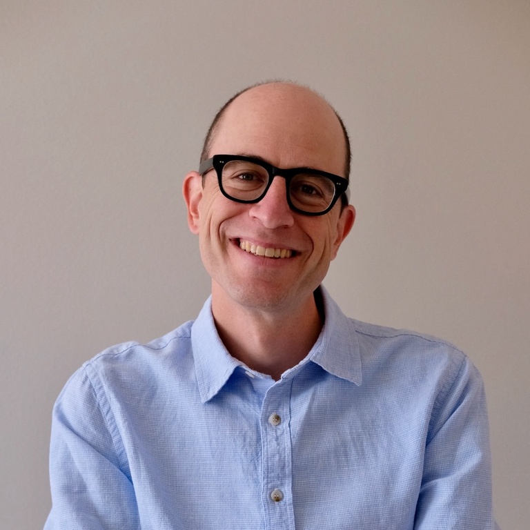 photo of David Gooblar, a bald person with dark rimmed glasses